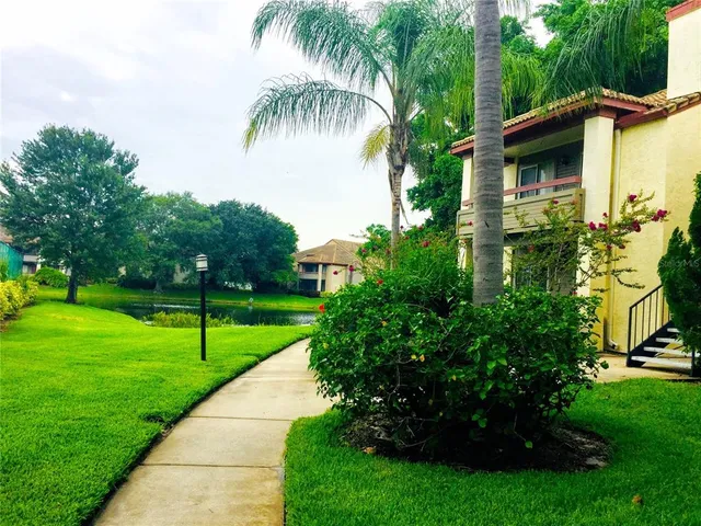 a view of a backyard with a garden