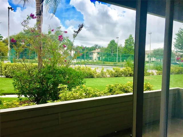 a bathroom with a glass door