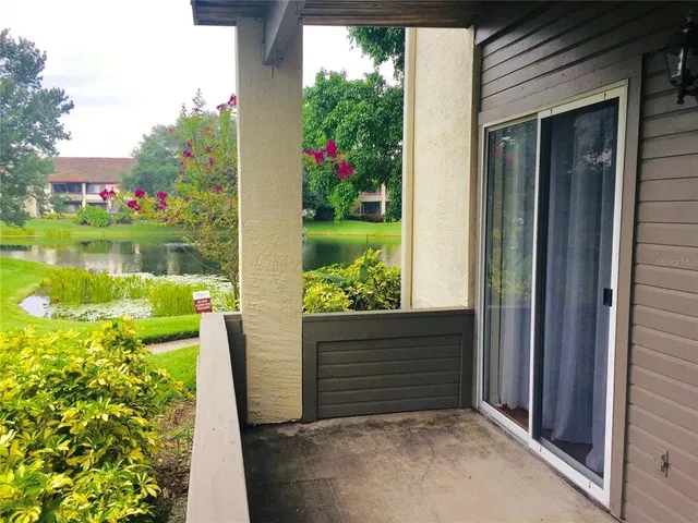 a view of a garden from a balcony