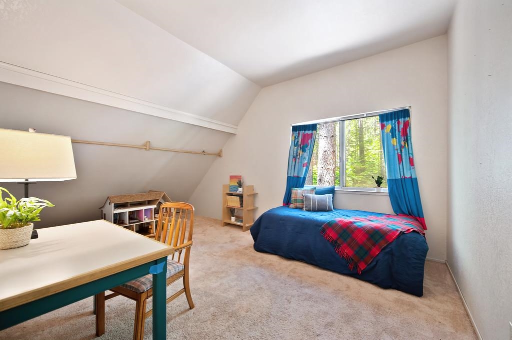 41107 Skyline Drive Emigrant Gap, CA 95715 - Photo 12 of 21 a bedroom with two beds and a table in it