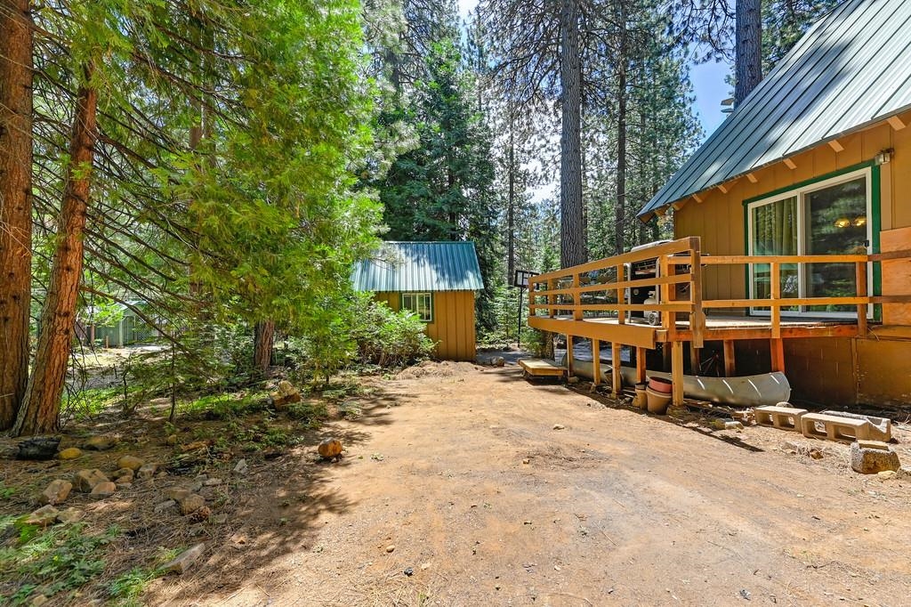 41107 Skyline Drive Emigrant Gap, CA 95715 - Photo 18 of 21 a view of a house with backyard and sitting area