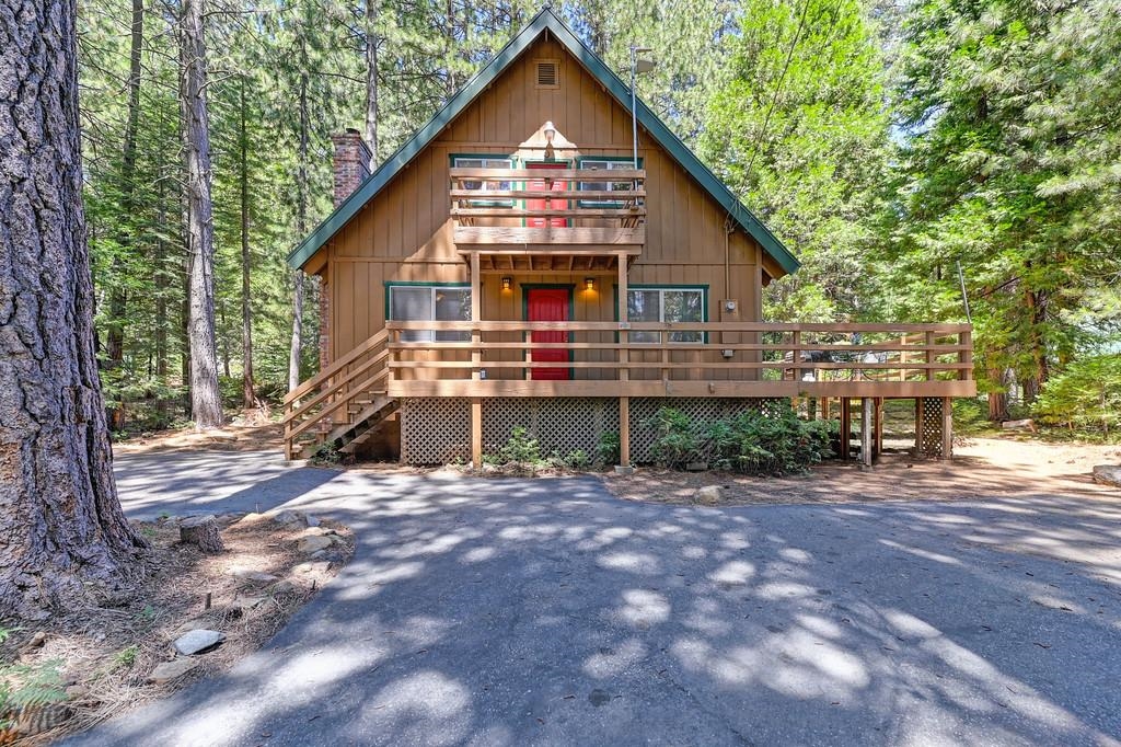 41107 Skyline Drive Emigrant Gap, CA 95715 - Photo 2 of 21 a front view of a house with a yard