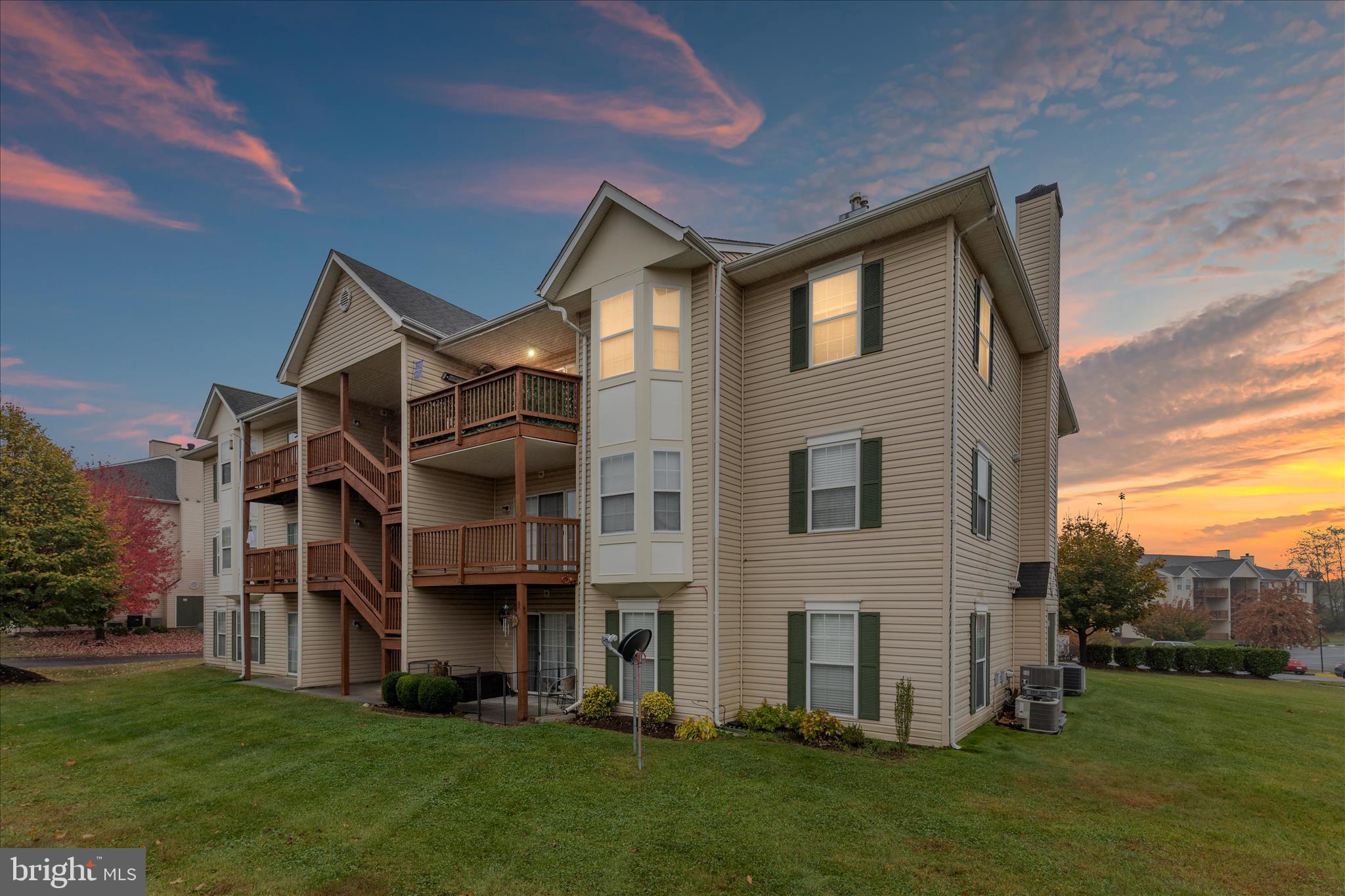 157 Brookland Terrace, Unit 11 Winchester, VA 22602 - Photo 1 of 22 a front view of house with yard and green space