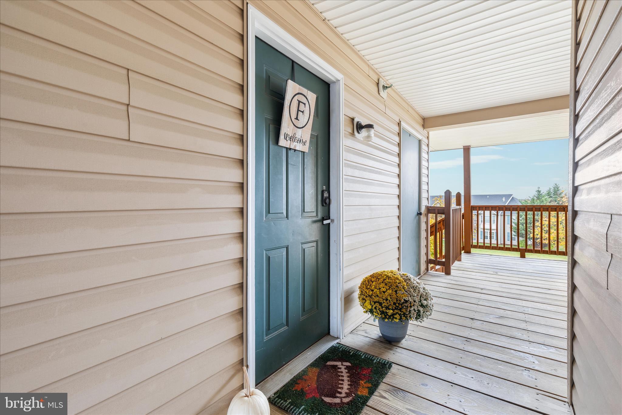 157 Brookland Terrace, Unit 11 Winchester, VA 22602 - Photo 20 of 22 a view of a balcony with chairs