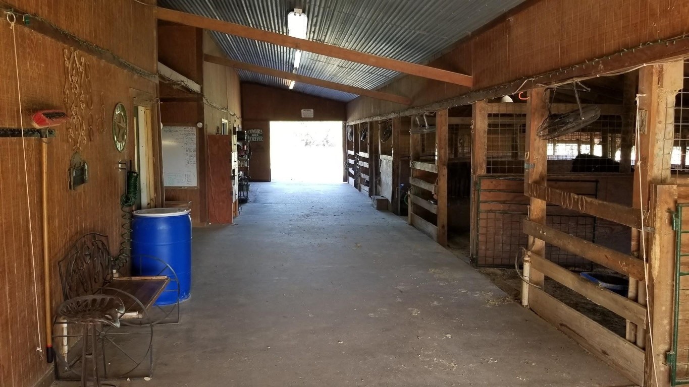 Tbd Fitzhugh Road Austin, TX 78736 - Photo 12 of 19 a view of walk in closet with clothes and shoes
