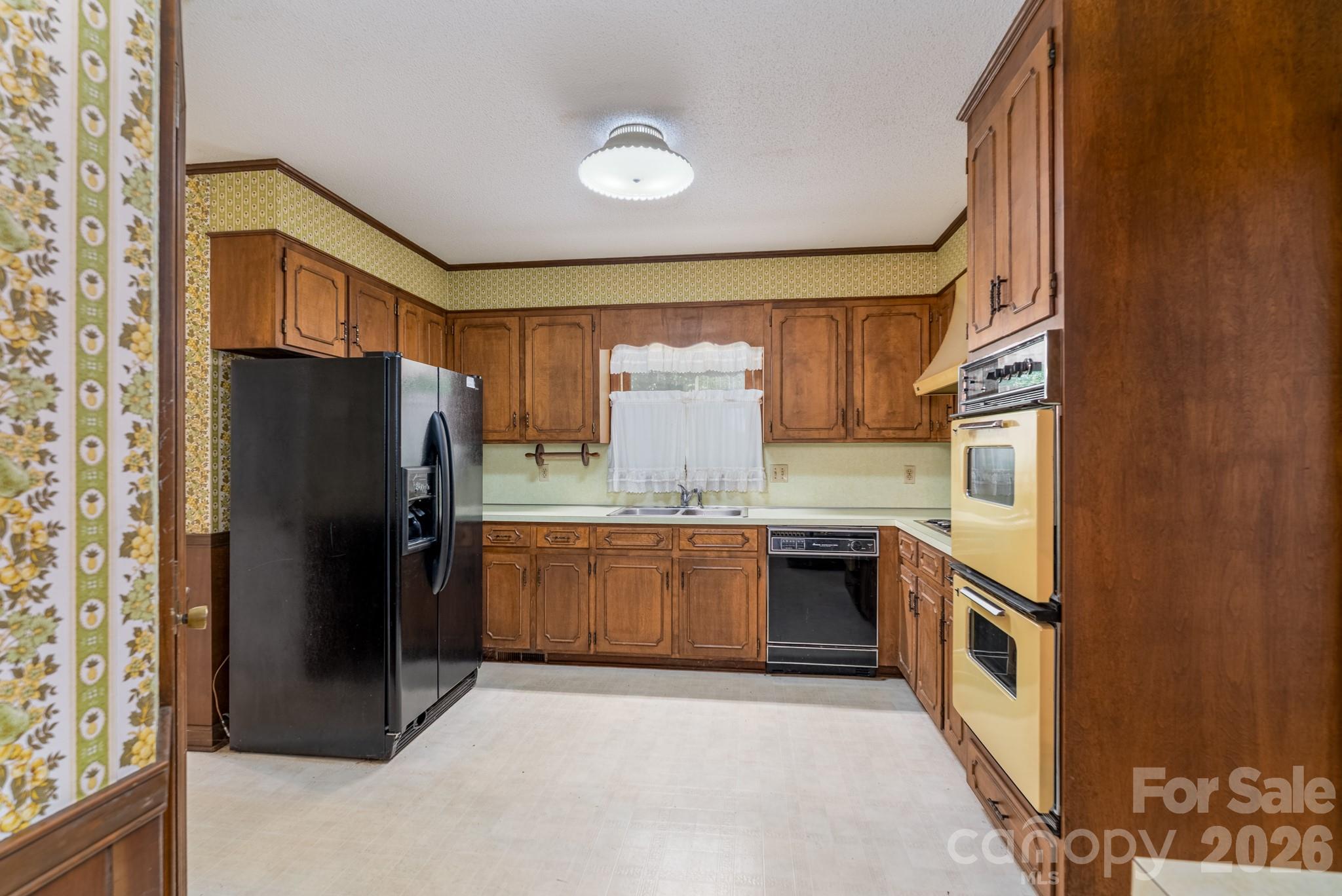 1836 Westbrook Road Edgemoor, SC 29712 - Photo 12 of 47 a kitchen with stainless steel appliances granite countertop a refrigerator stove and sink