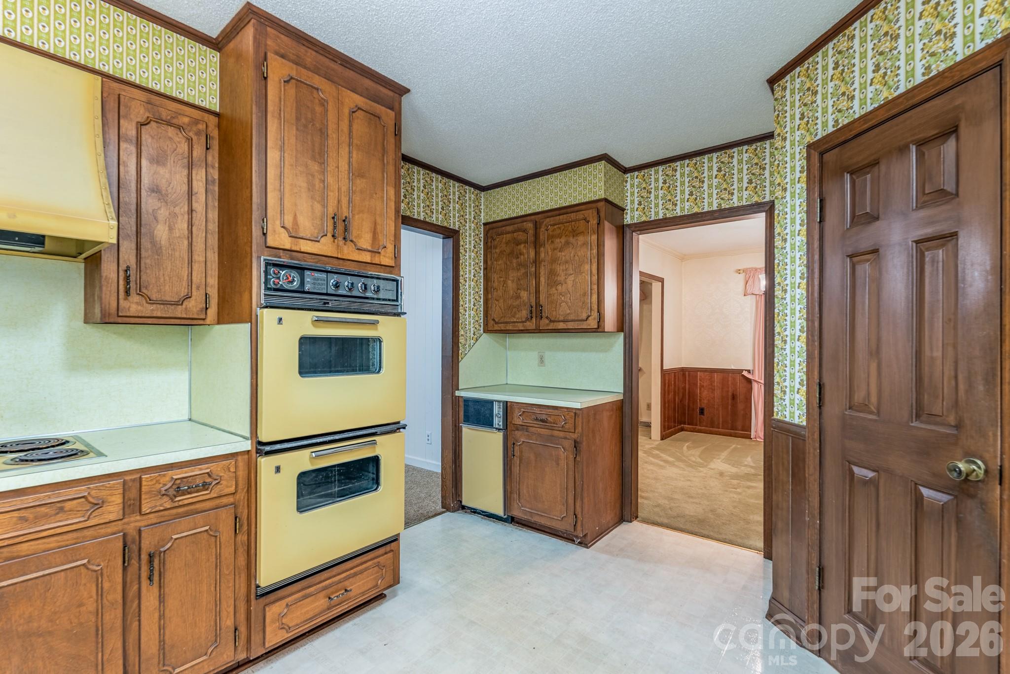 1836 Westbrook Road Edgemoor, SC 29712 - Photo 14 of 47 a kitchen with stainless steel appliances granite countertop a refrigerator and a stove