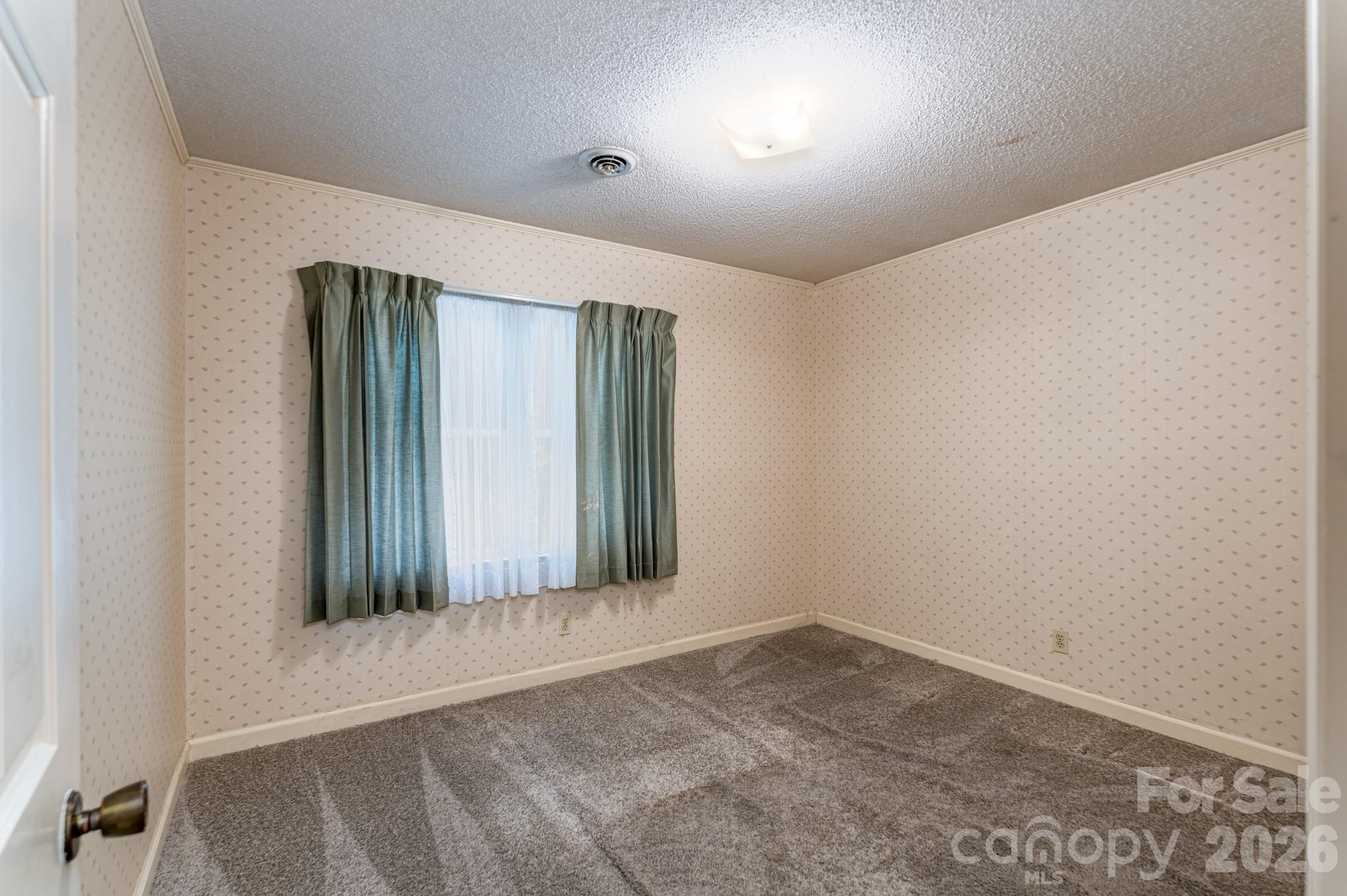 1836 Westbrook Road Edgemoor, SC 29712 - Photo 20 of 47 an empty room with a window