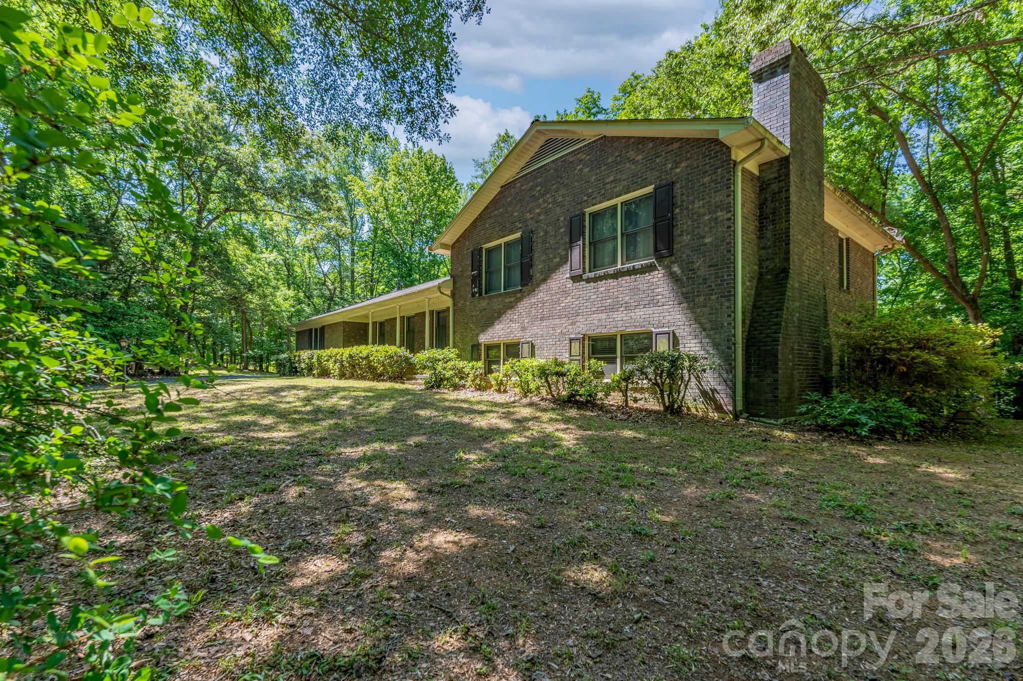 1836 Westbrook Road Edgemoor, SC 29712 - Photo 2 of 47 a front view of a house with garden