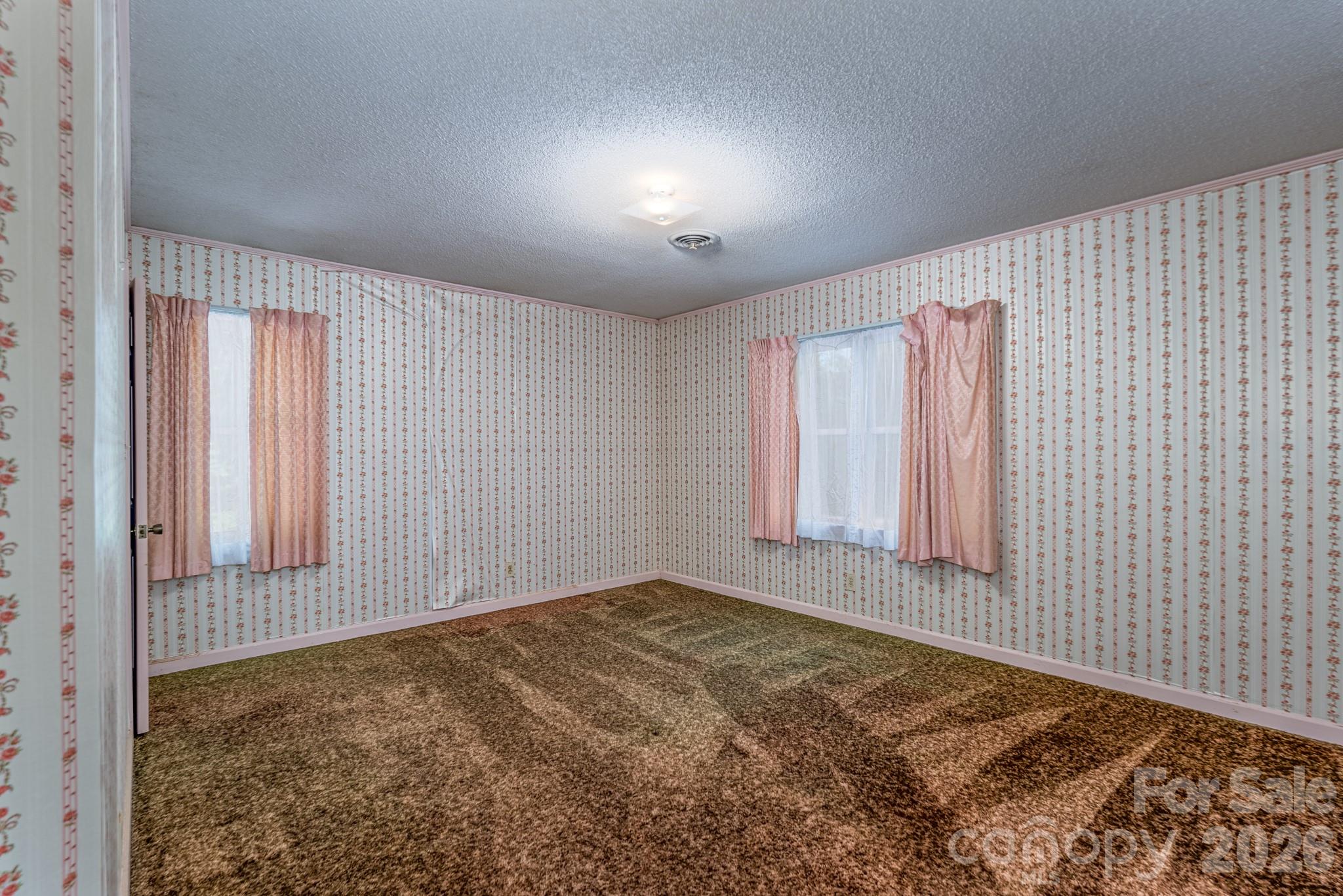 1836 Westbrook Road Edgemoor, SC 29712 - Photo 21 of 47 a view of an empty room with a window
