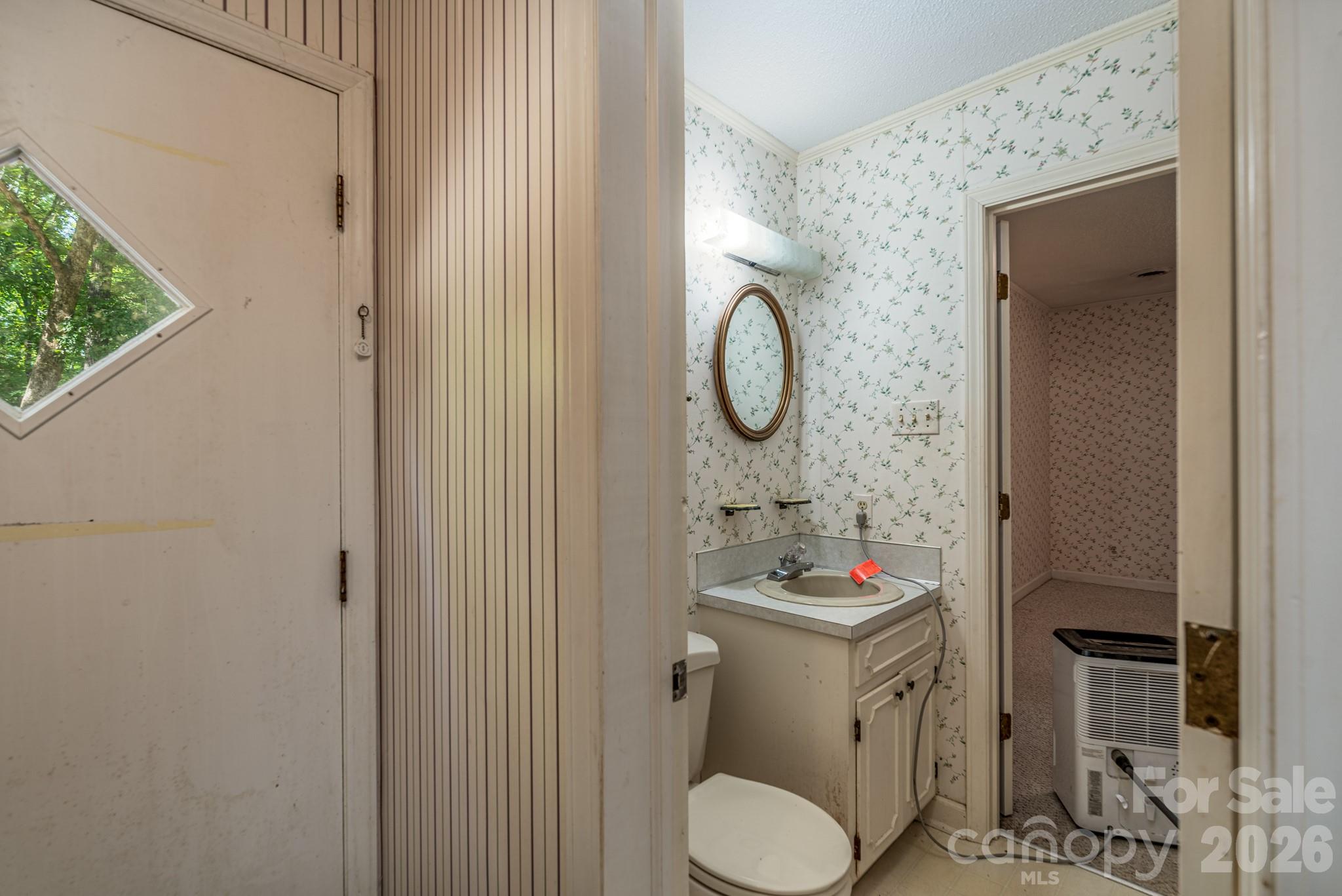 1836 Westbrook Road Edgemoor, SC 29712 - Photo 26 of 47 a bathroom with a sink toilet and shower