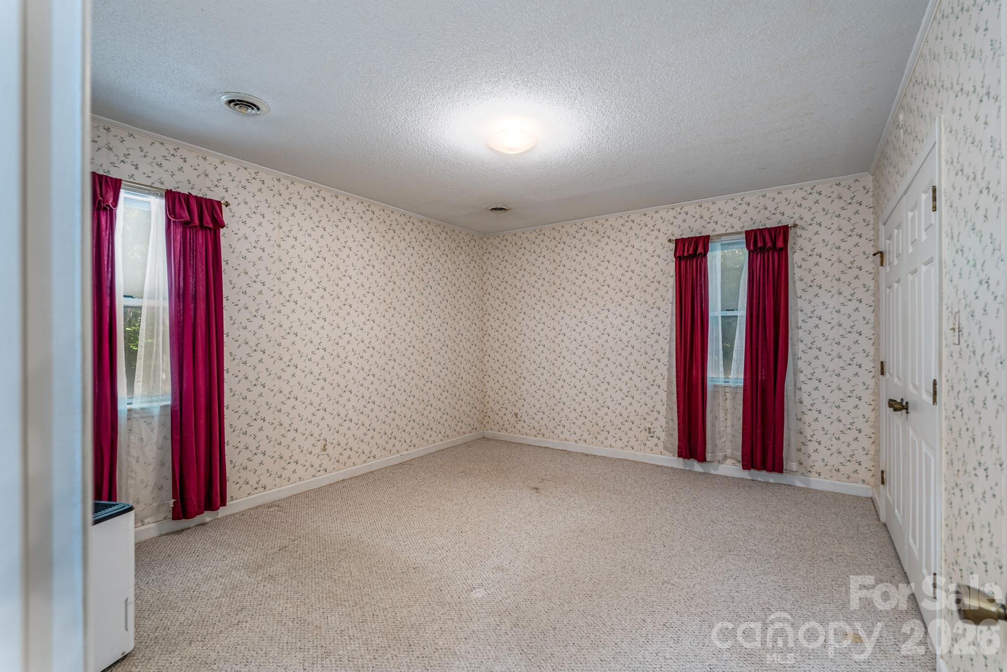 1836 Westbrook Road Edgemoor, SC 29712 - Photo 27 of 47 a view of a room with red walls and a window