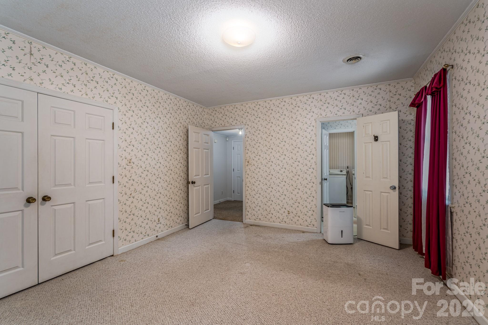 1836 Westbrook Road Edgemoor, SC 29712 - Photo 28 of 47 an empty room with fan and windows