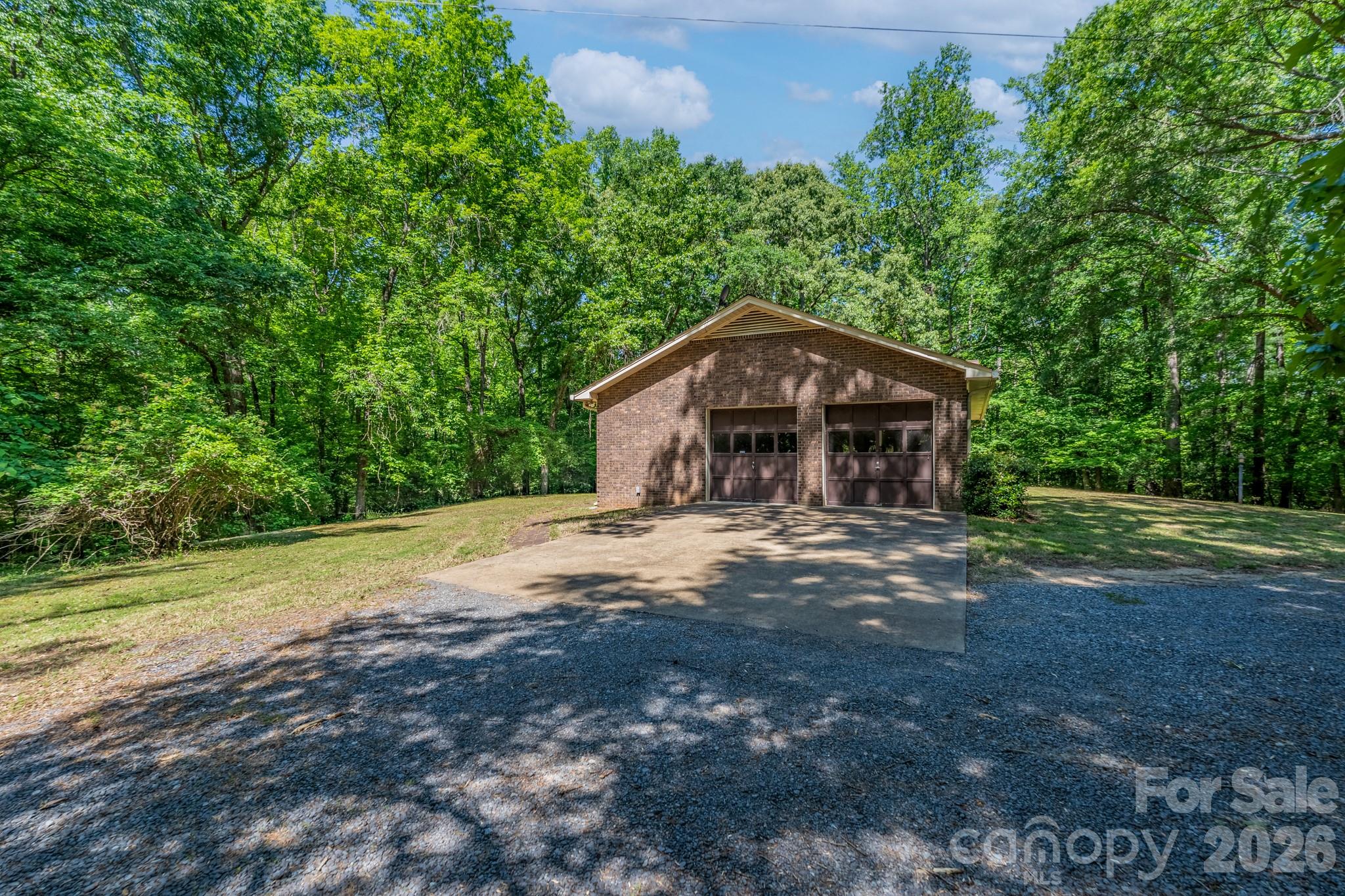 1836 Westbrook Road Edgemoor, SC 29712 - Photo 33 of 47 a view of a wooden house with a yard