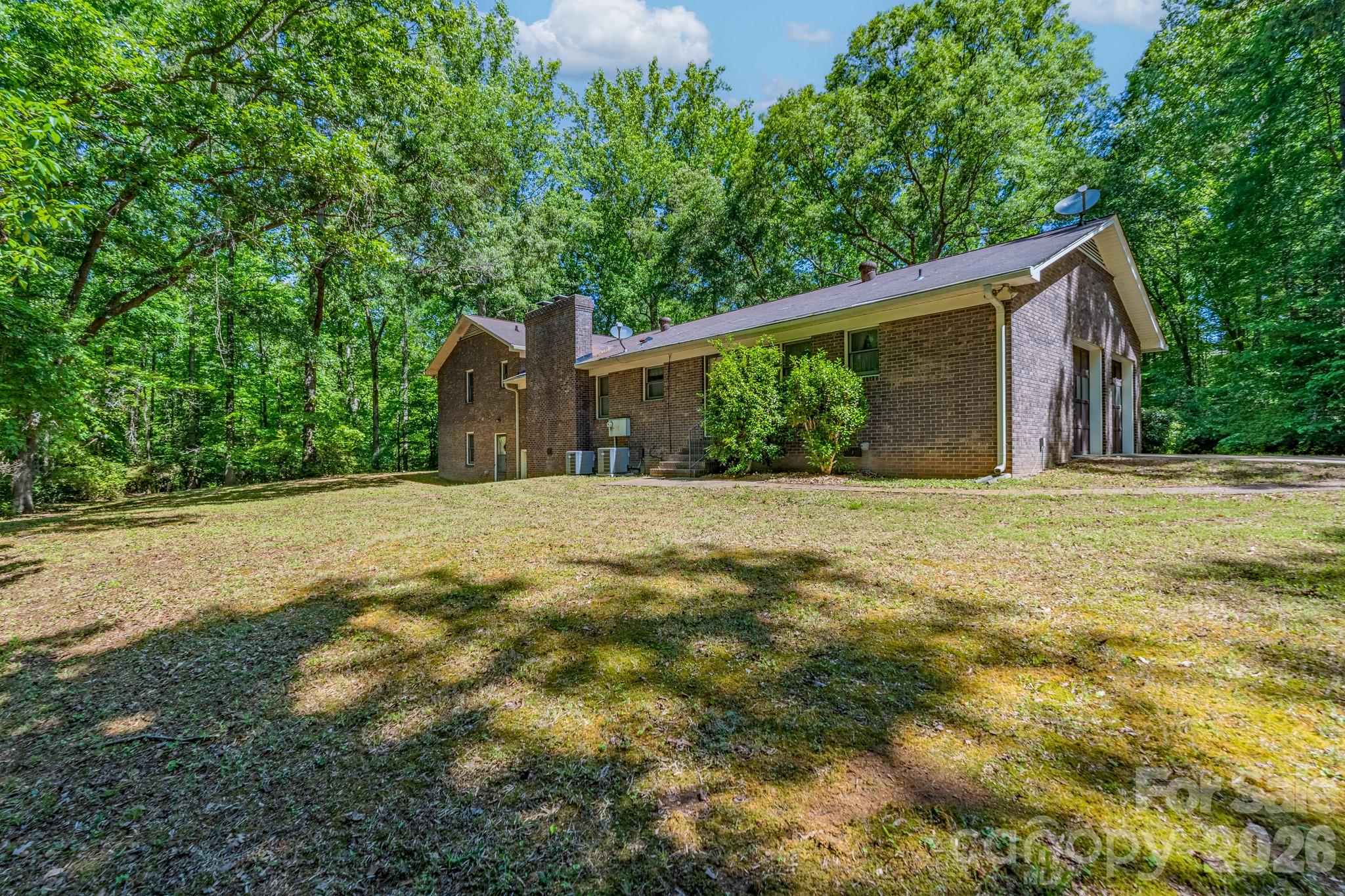1836 Westbrook Road Edgemoor, SC 29712 - Photo 35 of 47 a front view of house with yard and trees