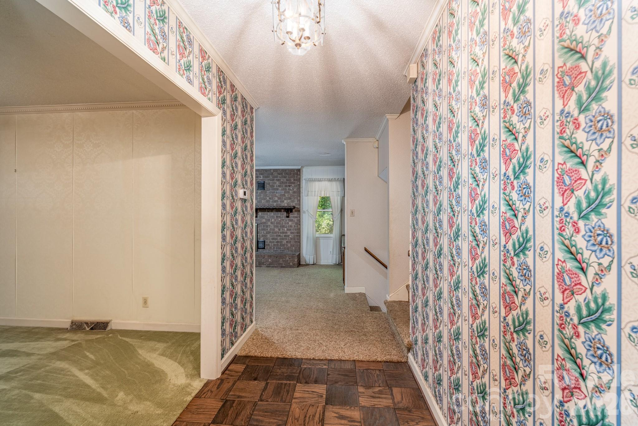 1836 Westbrook Road Edgemoor, SC 29712 - Photo 4 of 47 a view of a hallway with wooden floor and entryway