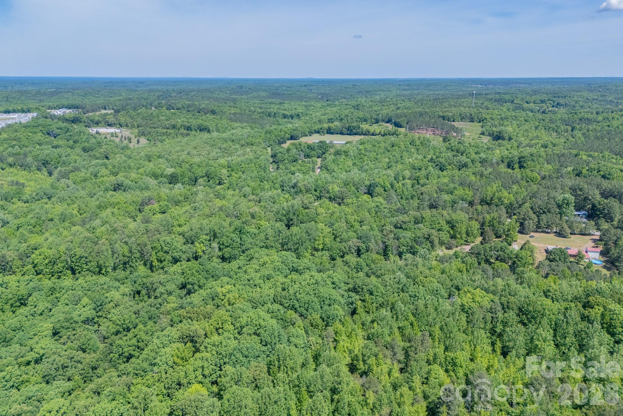 1836 Westbrook Road Edgemoor, SC 29712 - Photo 46 of 47 a view of a green field with lots of bushes