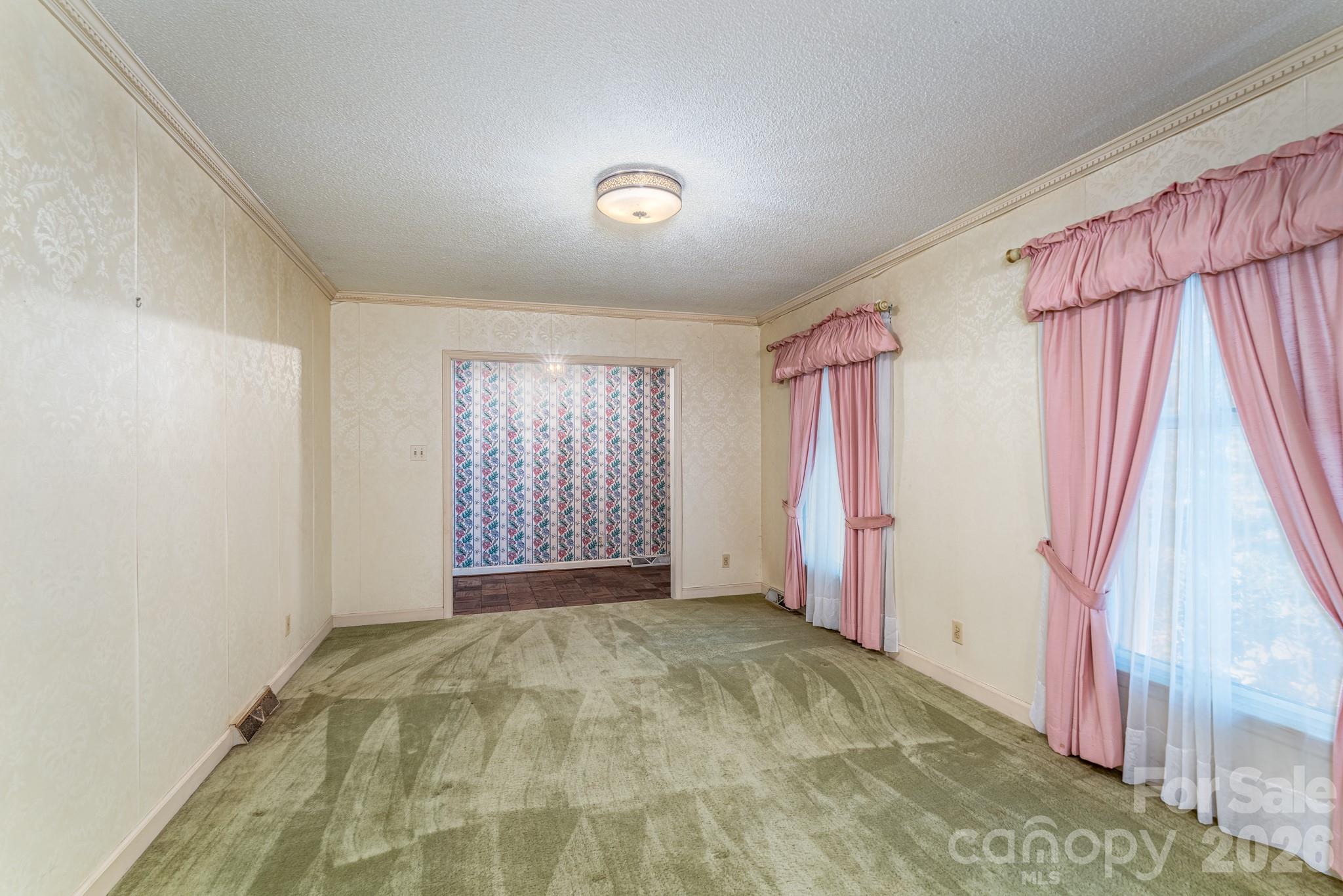 1836 Westbrook Road Edgemoor, SC 29712 - Photo 7 of 47 a view of an empty room with a window