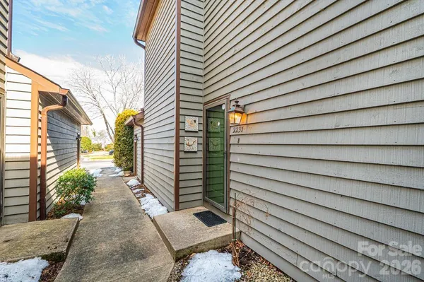 a view of a back yard of the house