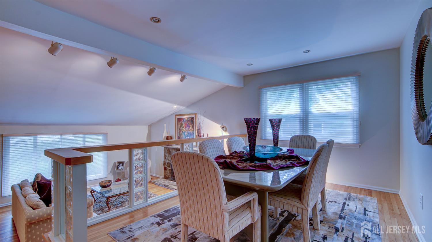 15 Timber Road East Brunswick, NJ 08816 - Photo 17 of 40 a view of a dining room with furniture and wooden floor