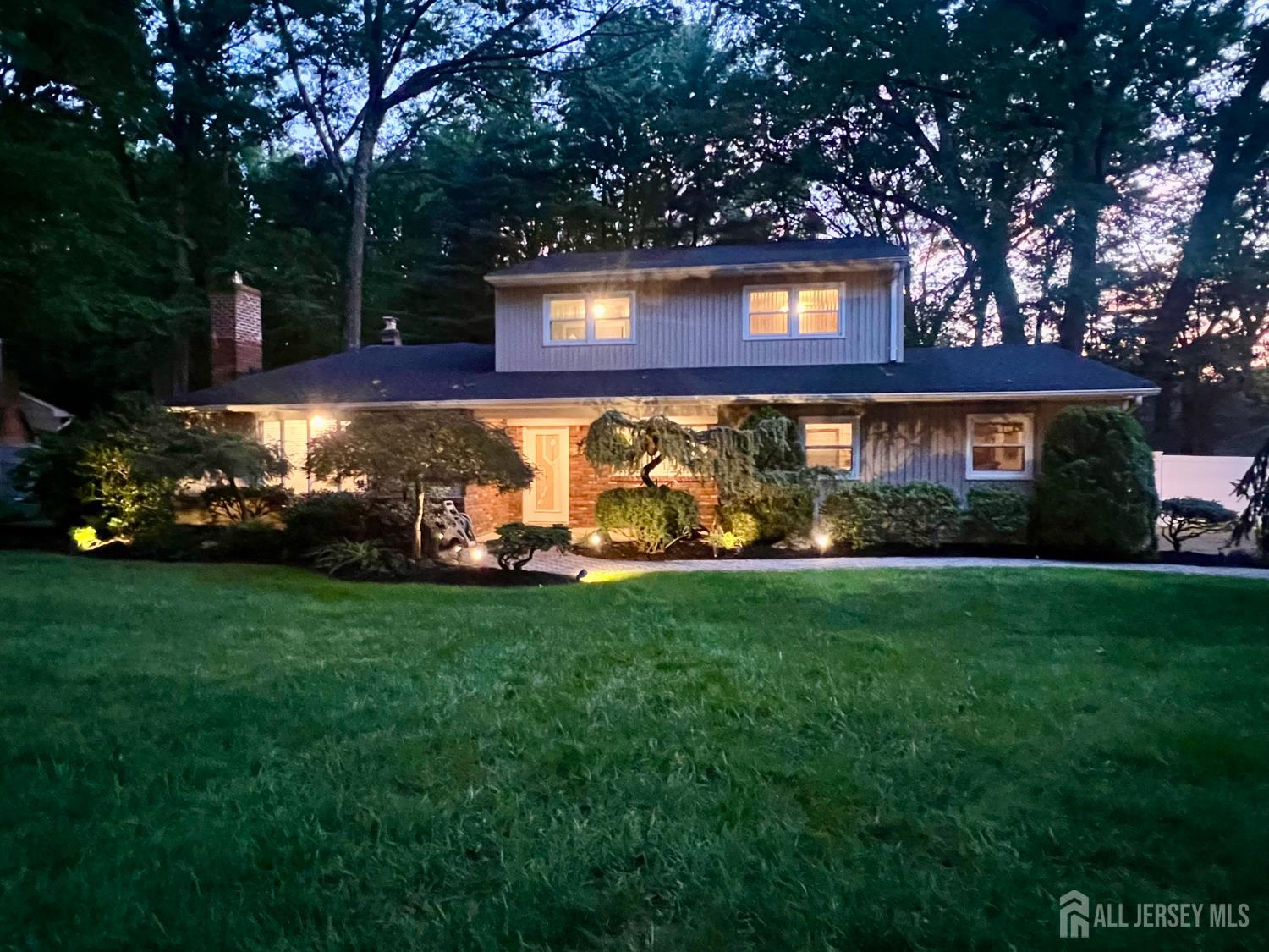 15 Timber Road East Brunswick, NJ 08816 - Photo 2 of 40 a front view of a house with garden