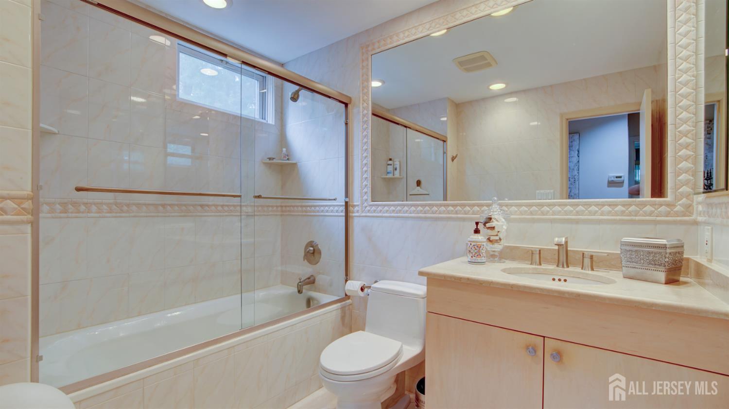 15 Timber Road East Brunswick, NJ 08816 - Photo 23 of 40 a bathroom with a sink a toilet and a bathtub