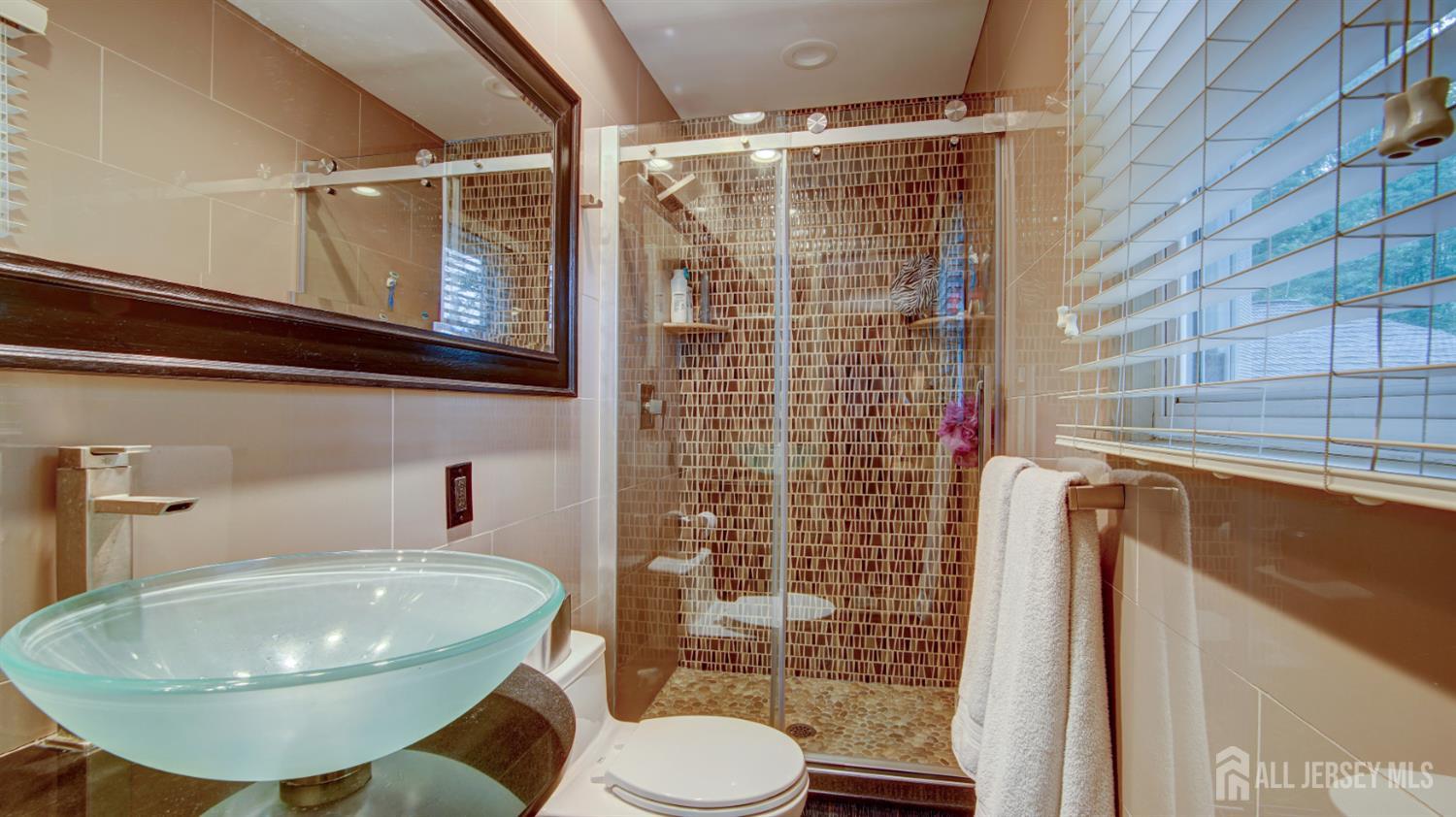 15 Timber Road East Brunswick, NJ 08816 - Photo 28 of 40 a bathroom with a sink toilet and shower