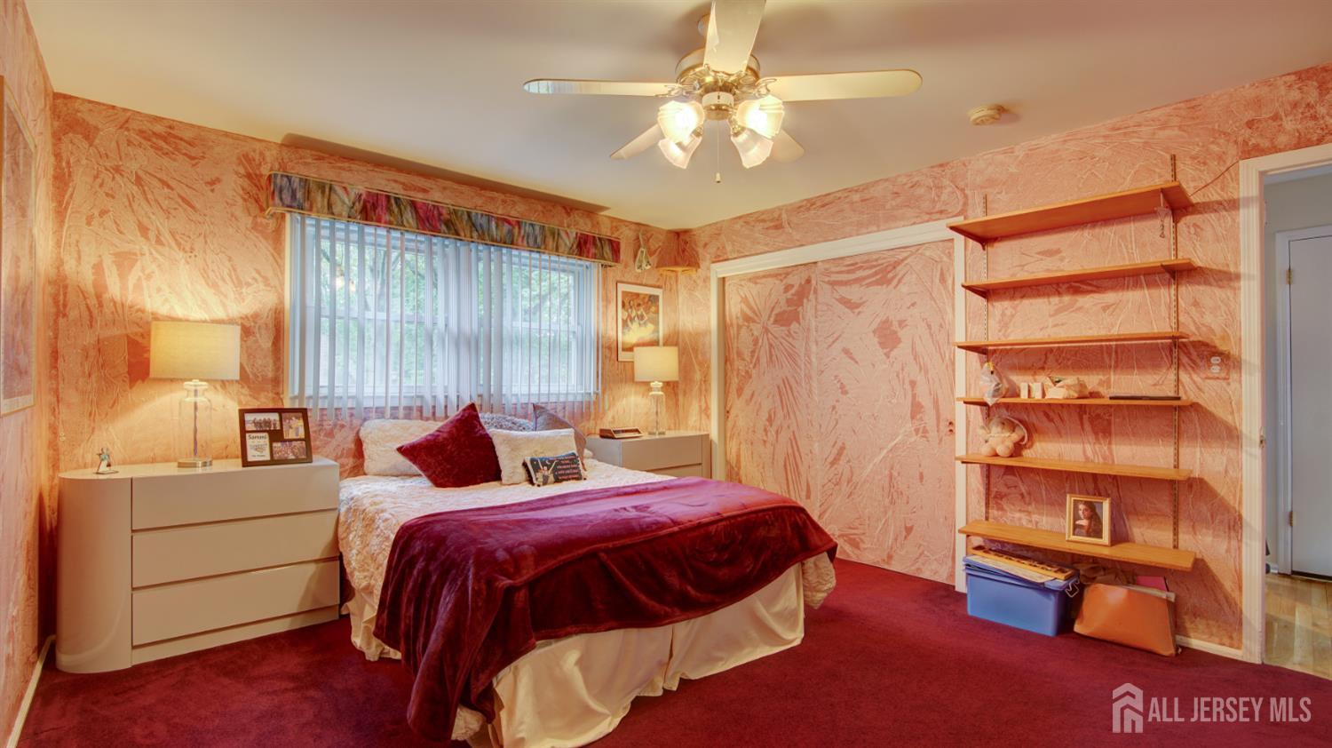 15 Timber Road East Brunswick, NJ 08816 - Photo 32 of 40 a bedroom with a bed and a book shelf