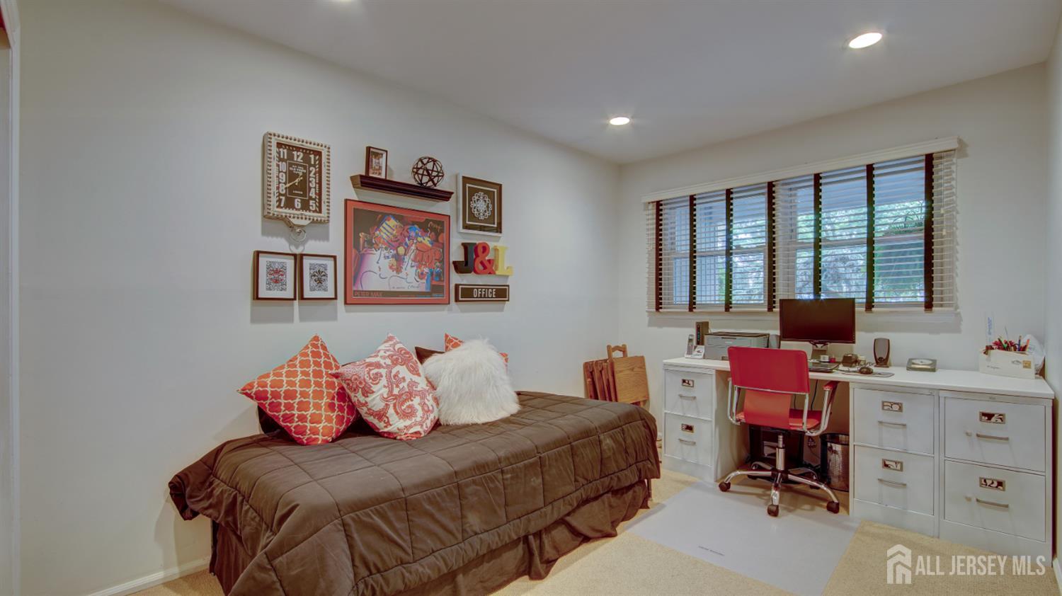 15 Timber Road East Brunswick, NJ 08816 - Photo 33 of 40 a bedroom with a bed and a large window