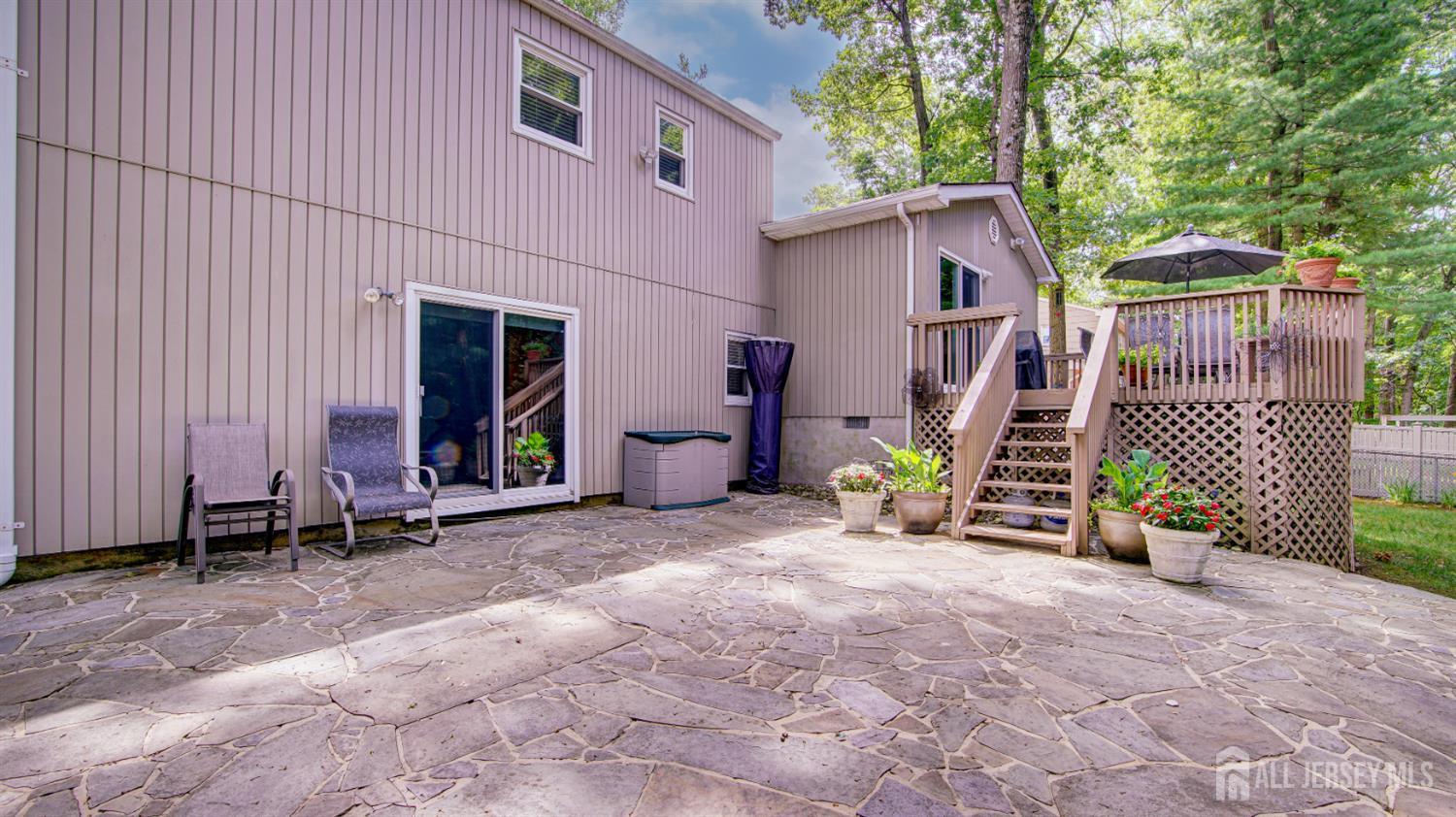 15 Timber Road East Brunswick, NJ 08816 - Photo 35 of 40 a view of a chairs in front of house