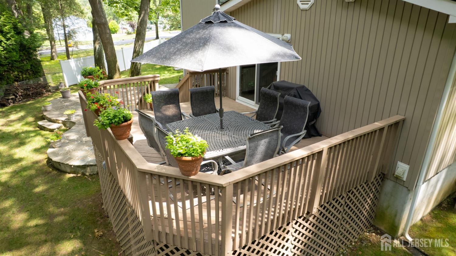 15 Timber Road East Brunswick, NJ 08816 - Photo 39 of 40 a front view of house with outdoor seating
