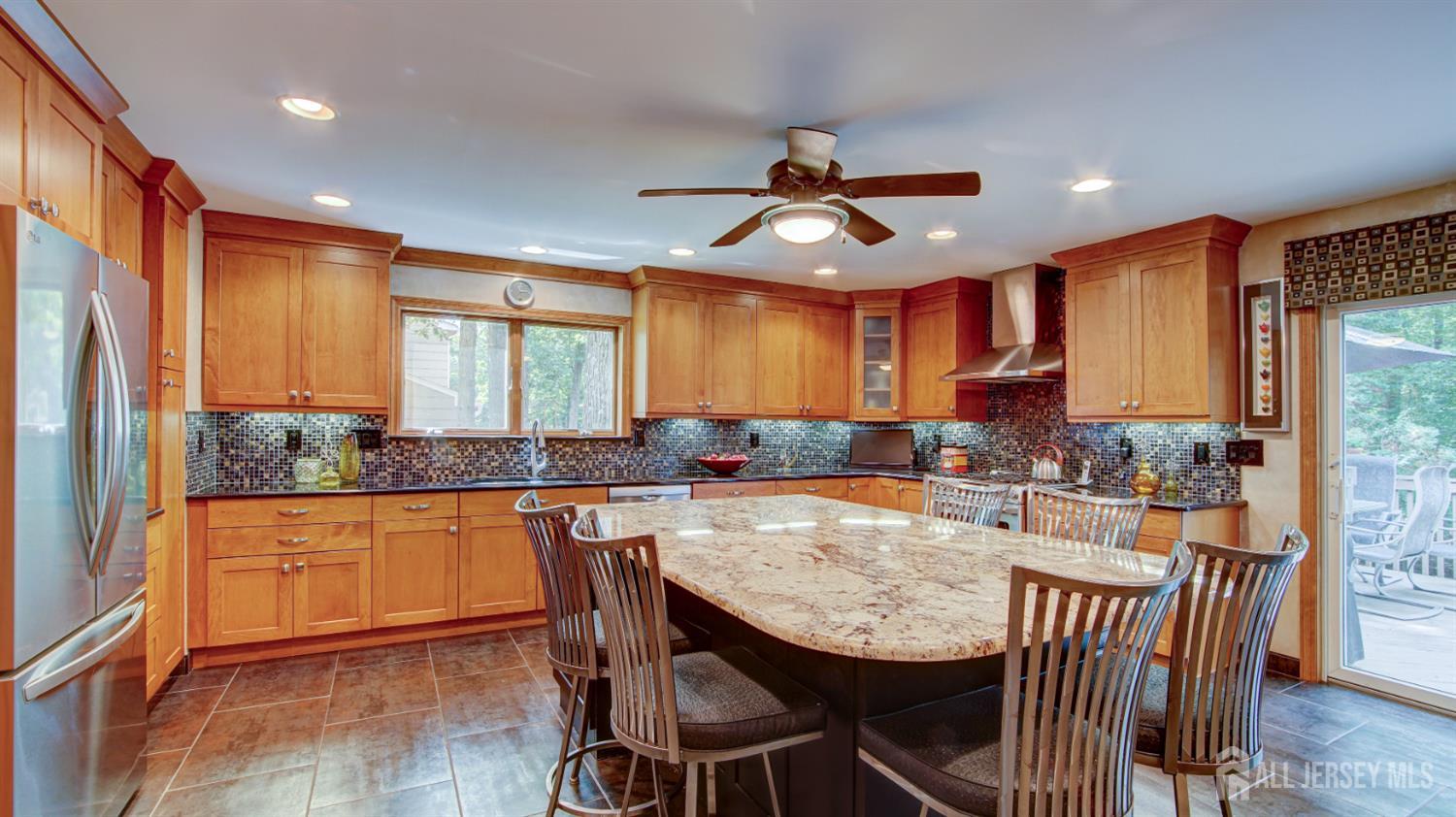 15 Timber Road East Brunswick, NJ 08816 - Photo 10 of 40 a view of a dining room with furniture window and wooden floor