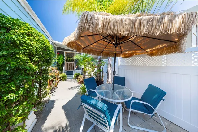 a view of an outdoor sitting area with swimming pool