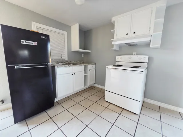 a storage room with washer and dryer