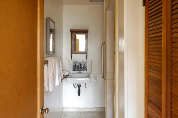 a en suite bathroom with a toilet sink