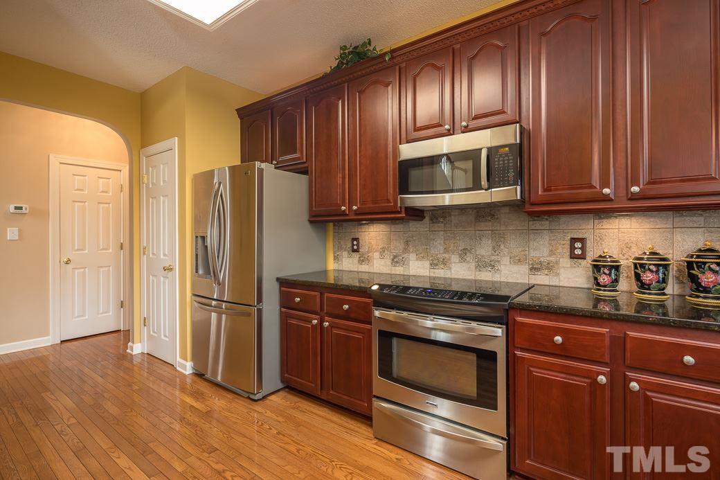 9020 Breeland Way Raleigh, NC 27613 - Photo 4 of 25