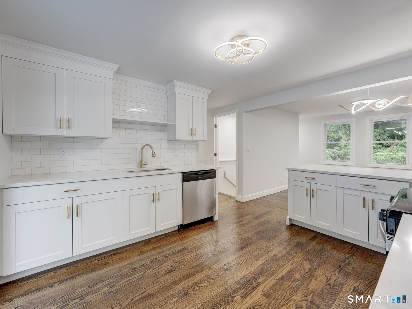 11 Cheshire Road Prospect, CT 06712 - Photo 3 of 38 a kitchen with sink stove and cabinets