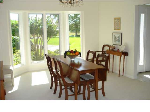 484 Shipwreck Road Santa Rosa Beach, FL 32459 - Photo 8 of 15 a dining room with furniture and window