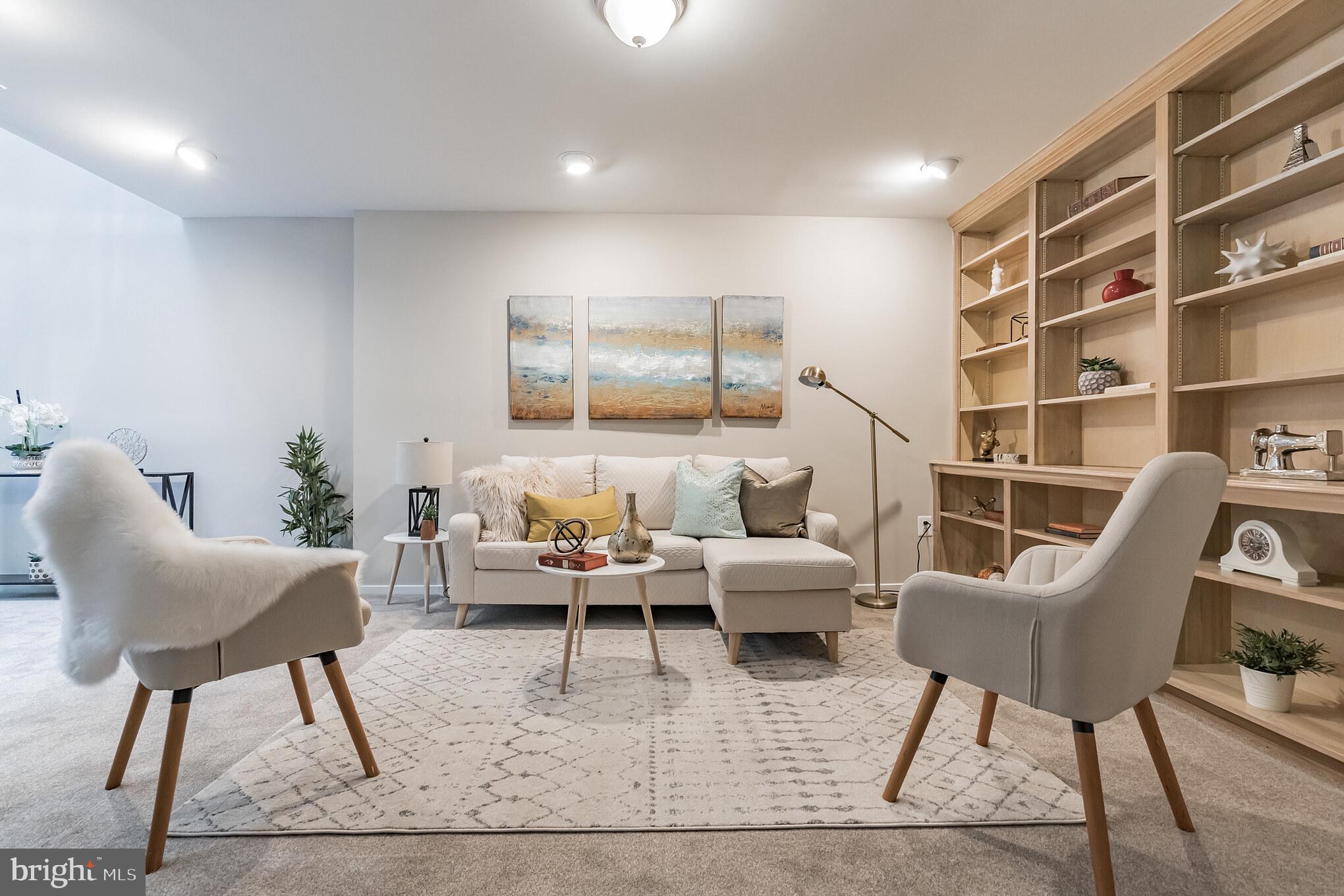 1375 Alderton Lane Silver Spring, MD 20906 - Photo 25 of 28 Recreation room with built in bookshelves