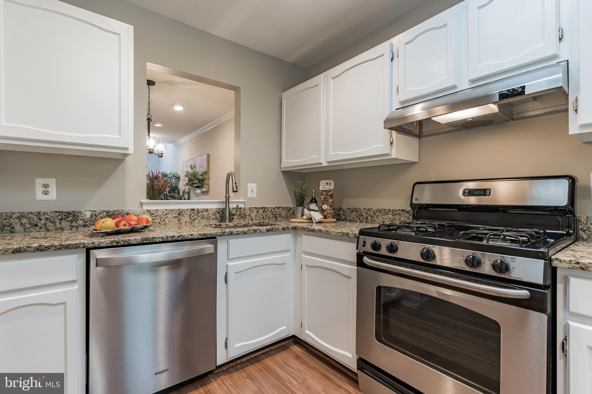 1375 Alderton Lane Silver Spring, MD 20906 - Photo 6 of 28 Kitchen with granite counters, stainless steel app
