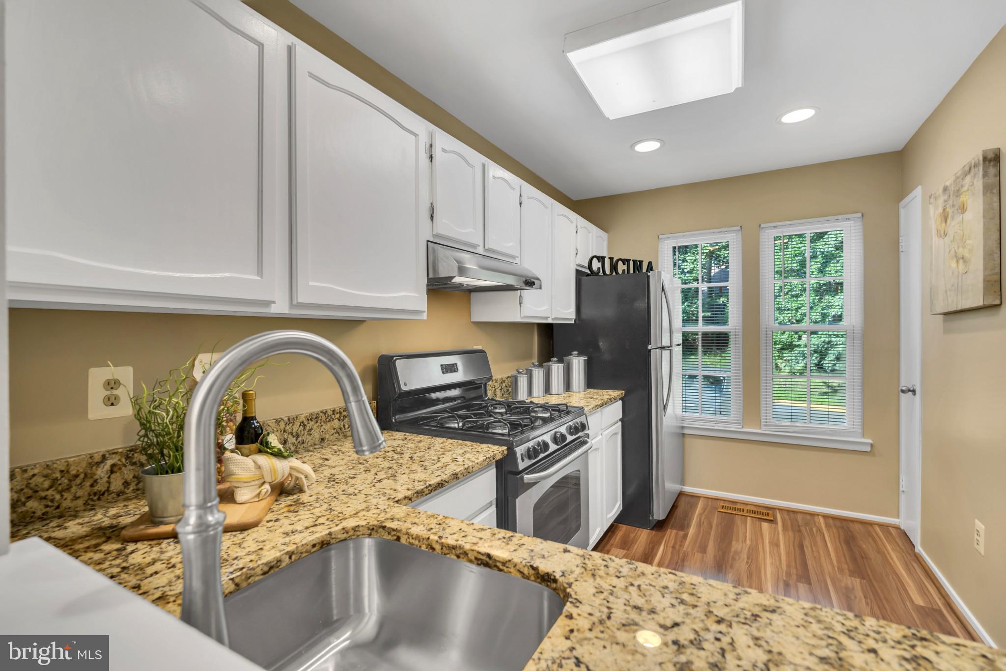 1375 Alderton Lane Silver Spring, MD 20906 - Photo 7 of 28 Windows and a pantry in the kitchen