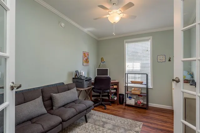 a living room with furniture and a window