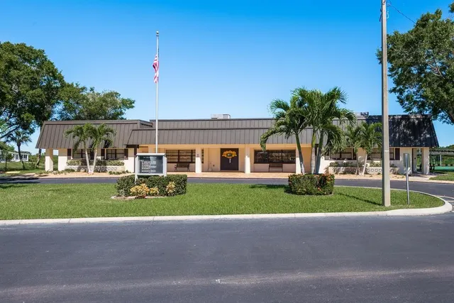 an aerial view of residential house with parking space