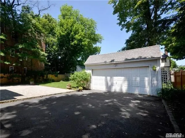 a view of house with yard