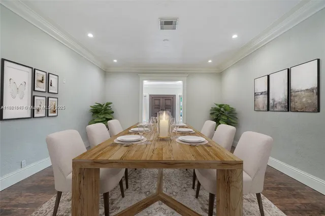 a view of a dining room with furniture