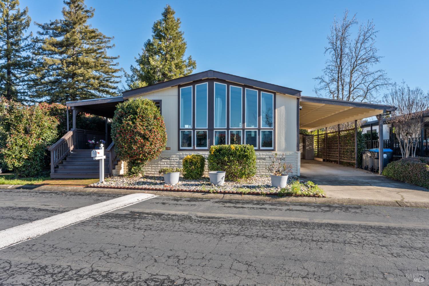51 Rancho Grande Drive Ukiah, CA 95482 - Photo 1 of 24 a front view of a house having garden