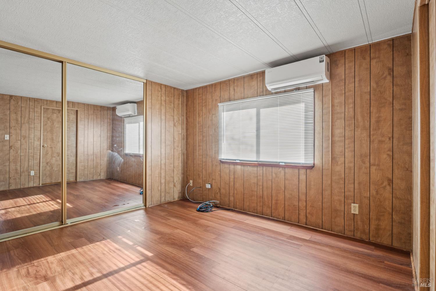 51 Rancho Grande Drive Ukiah, CA 95482 - Photo 17 of 24 a view of empty room with wooden floor and fan