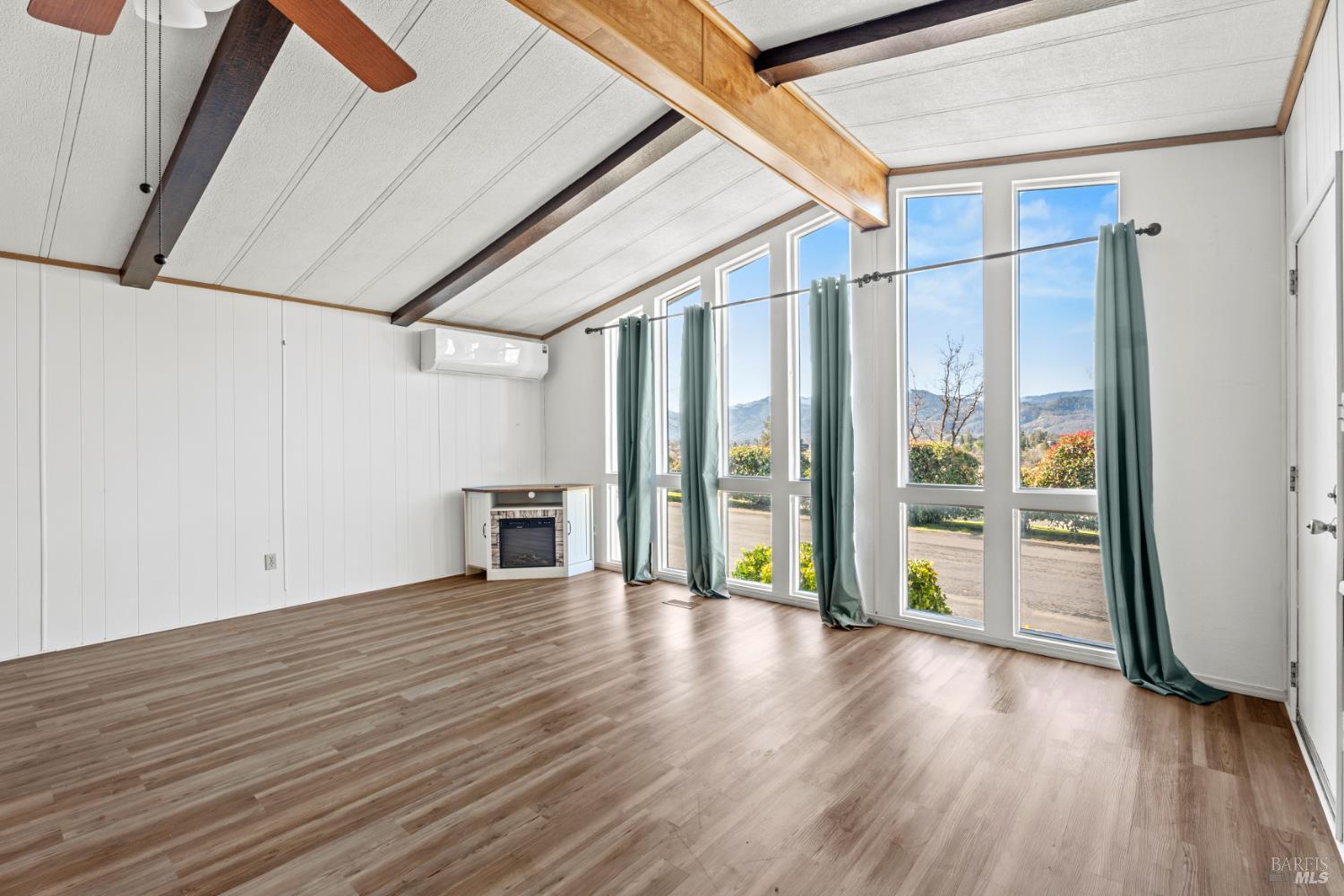 51 Rancho Grande Drive Ukiah, CA 95482 - Photo 3 of 24 a view of an empty room with wooden floor