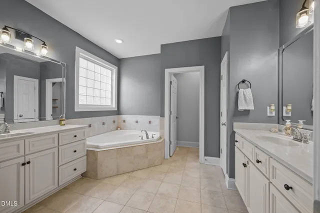 a bed room with furniture and a window