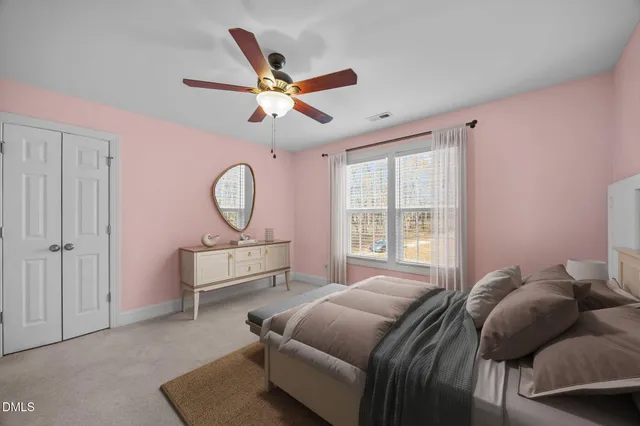 a balcony with furniture and wooden floor